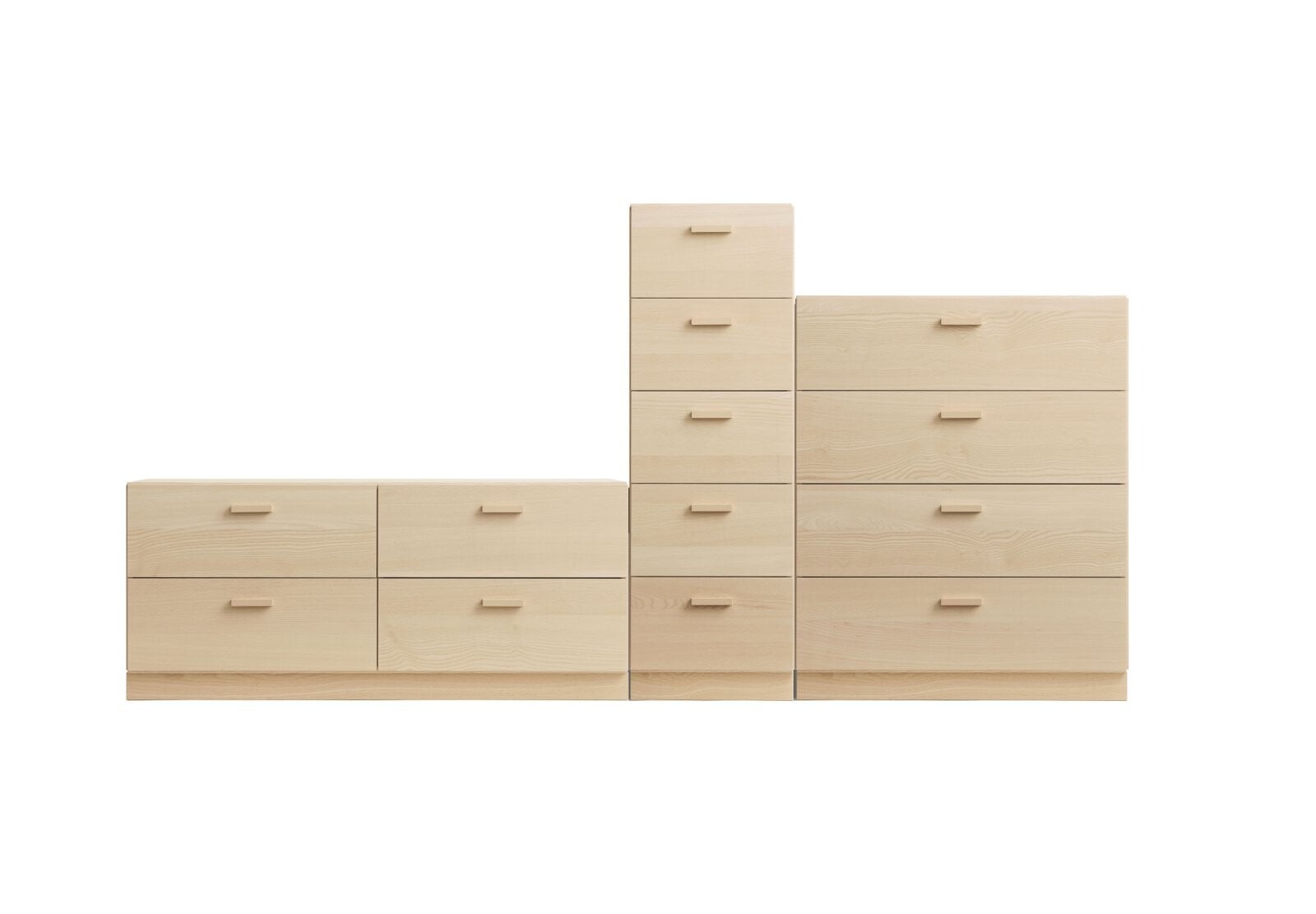 A dynamic combination from Relief. It consists of one tall, one low, and one wide chest of drawers from Relief. The three drawers are connected into one unit.