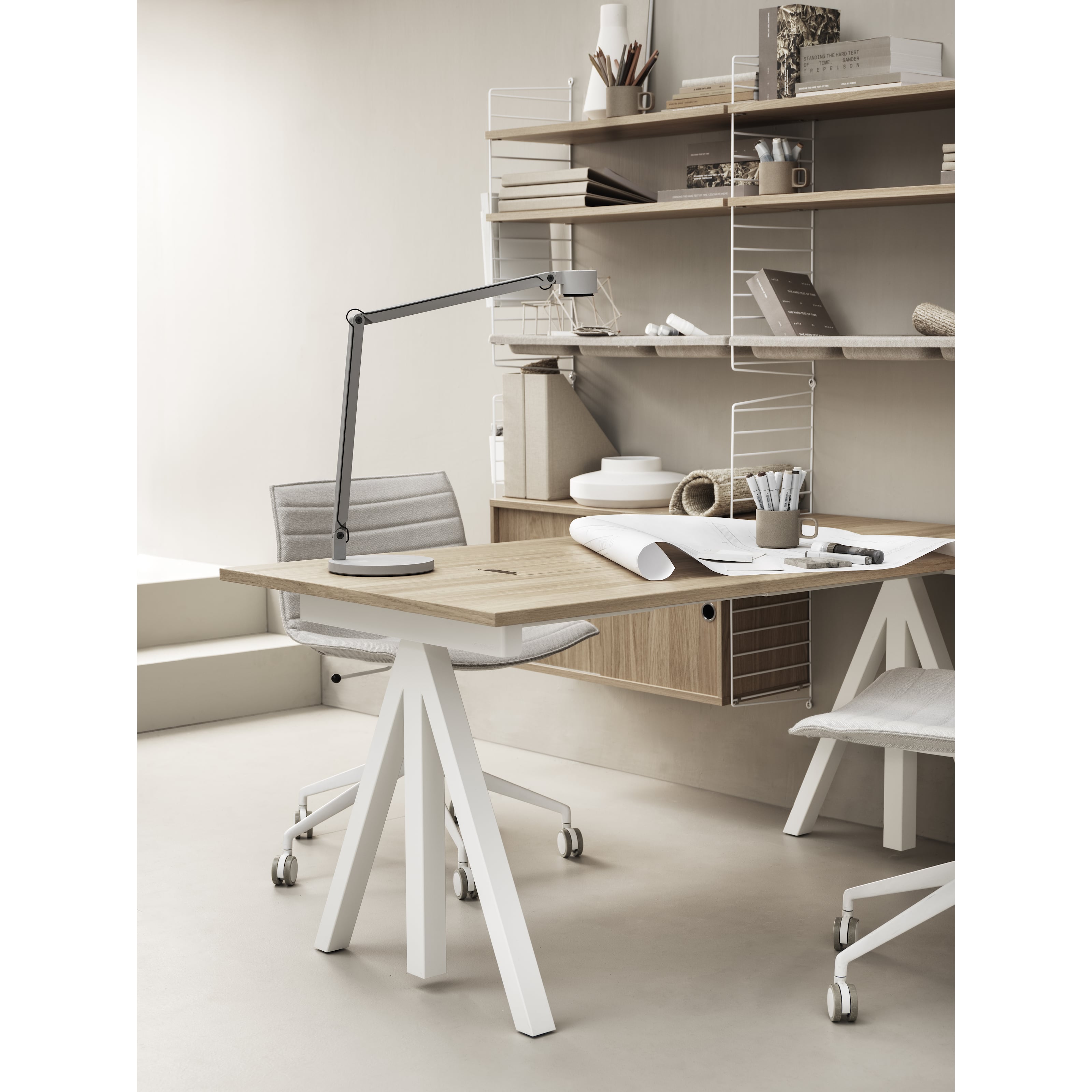 With its unique design, the work desk from Works makes it possible to create flexible workspaces. The work desk consists of one fixed table frame and one work desk with cable cover and the height can be adjusted 1 cm. The work desks with 78 cm depth are available in three widths: 120, 140 and 160 cm. The work desk with 90 cm depth and 180 cm width is intended for a meeting table or for a larger workspace, which is why the cable cover is placed in the middle. The frame’s height (including the work desk) is 72.5 cm and fits to all work desks.