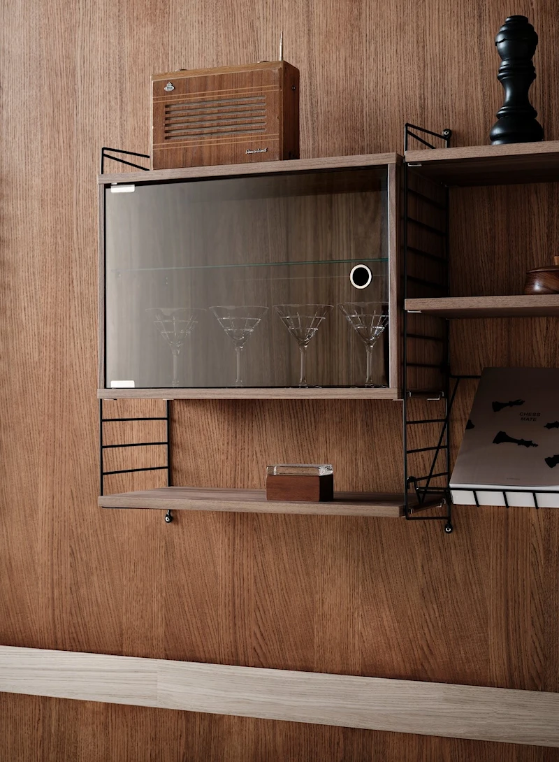 Display cabinet with swing glass door
