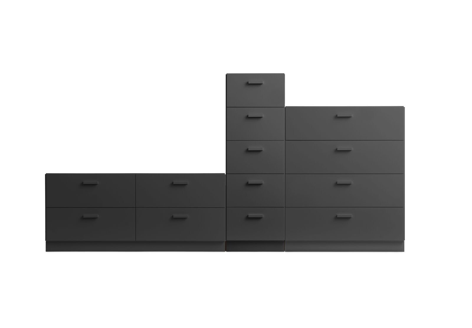 A dynamic combination from Relief. It consists of one tall, one low, and one wide chest of drawers from Relief. The three drawers are connected into one unit.