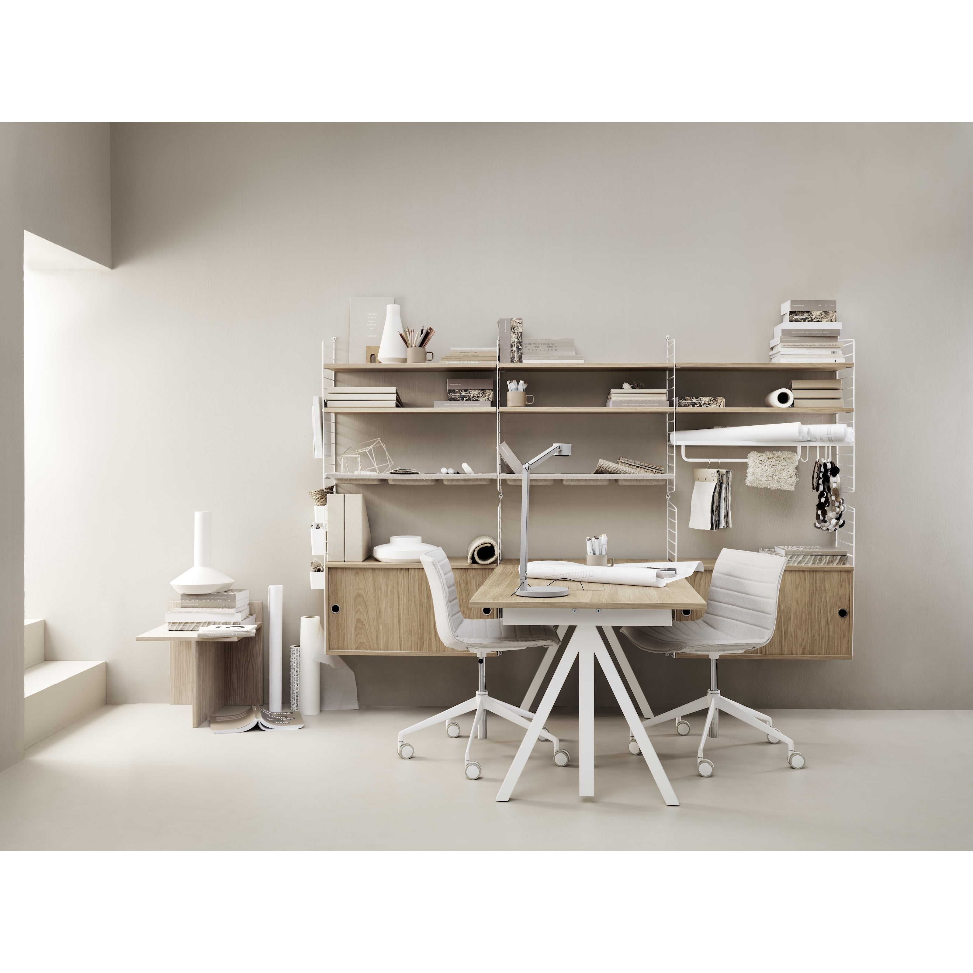 With its unique design, the work desk from Works makes it possible to create flexible workspaces. The work desk consists of one fixed table frame and one work desk with cable cover and the height can be adjusted 1 cm. The work desks with 78 cm depth are available in three widths: 120, 140 and 160 cm. The work desk with 90 cm depth and 180 cm width is intended for a meeting table or for a larger workspace, which is why the cable cover is placed in the middle. The frame’s height (including the work desk) is 72.5 cm and fits to all work desks.