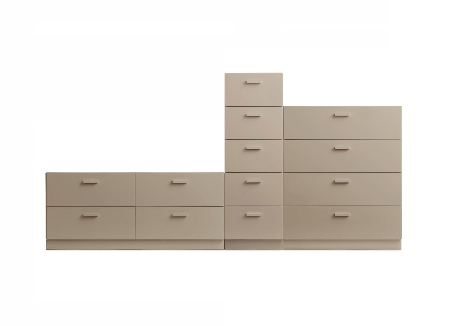 A dynamic combination from Relief. It consists of one tall, one low, and one wide chest of drawers from Relief. The three drawers are connected into one unit.