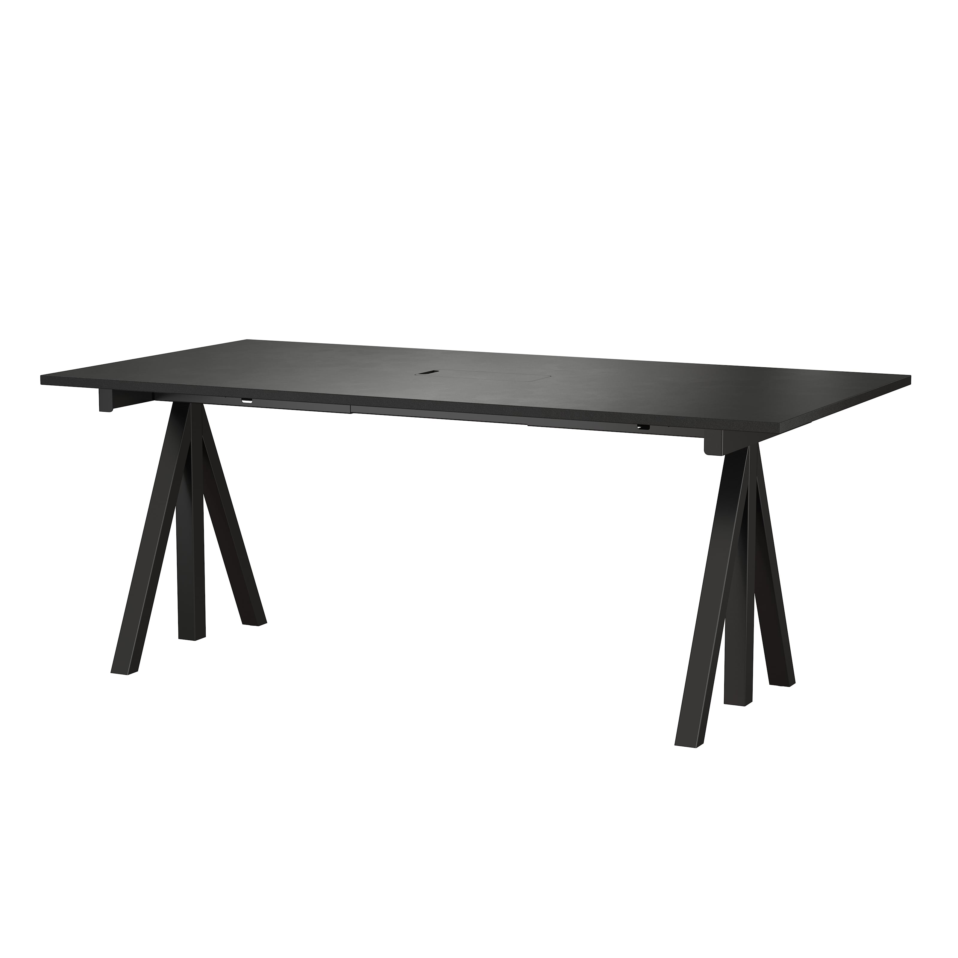 With its unique design, the work desk from Works makes it possible to create flexible workspaces. The work desk consists of one fixed table frame and one work desk with cable cover and the height can be adjusted 1 cm. The work desks with 78 cm depth are available in three widths: 120, 140 and 160 cm. The work desk with 90 cm depth and 180 cm width is intended for a meeting table or for a larger workspace, which is why the cable cover is placed in the middle. The frame’s height (including the work desk) is 72.5 cm and fits to all work desks.