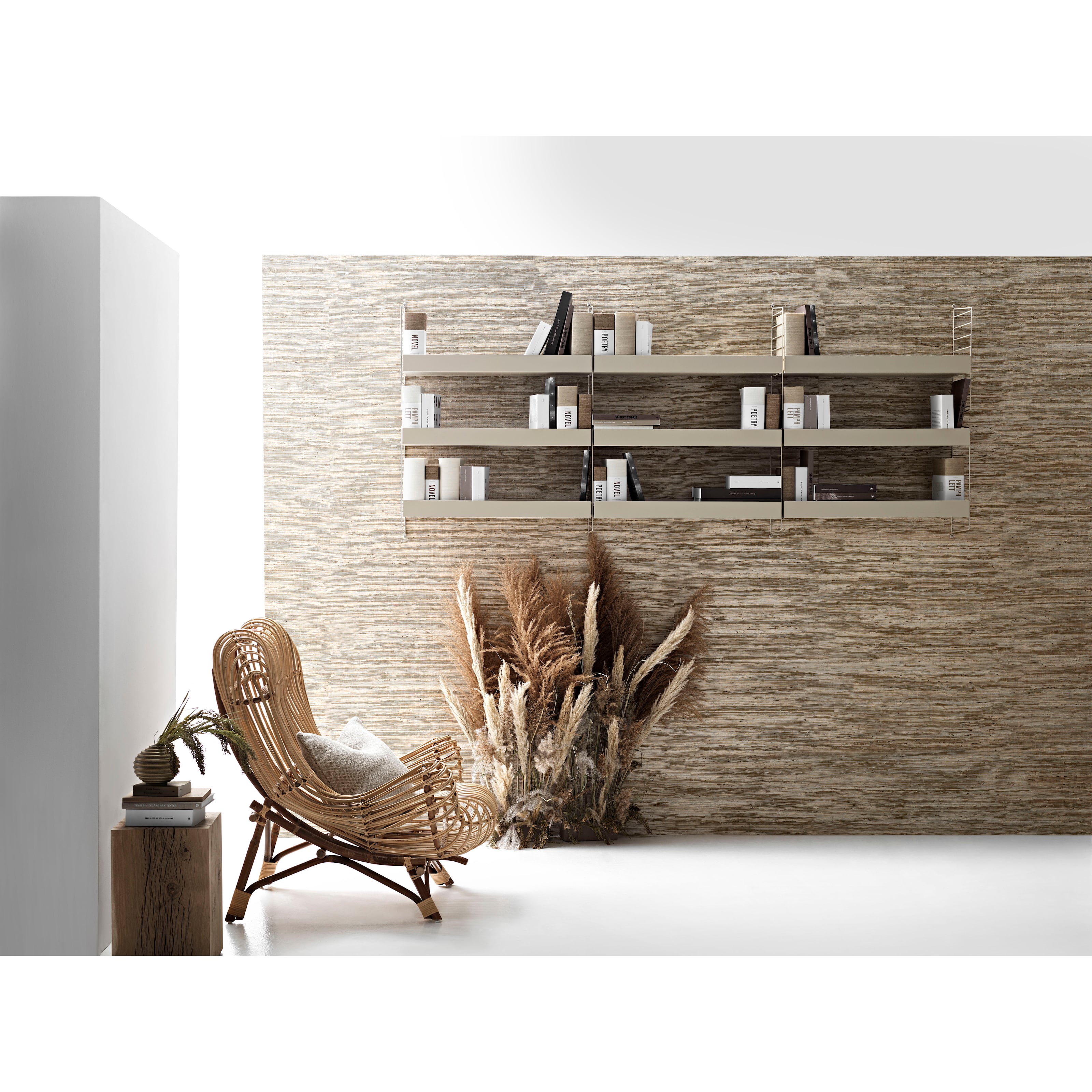 Wall-hung combination with a mix of metal shelves with high and low edge. Aesthetically pleasing to look at with convenient high edges to hide things like the TV remote control.