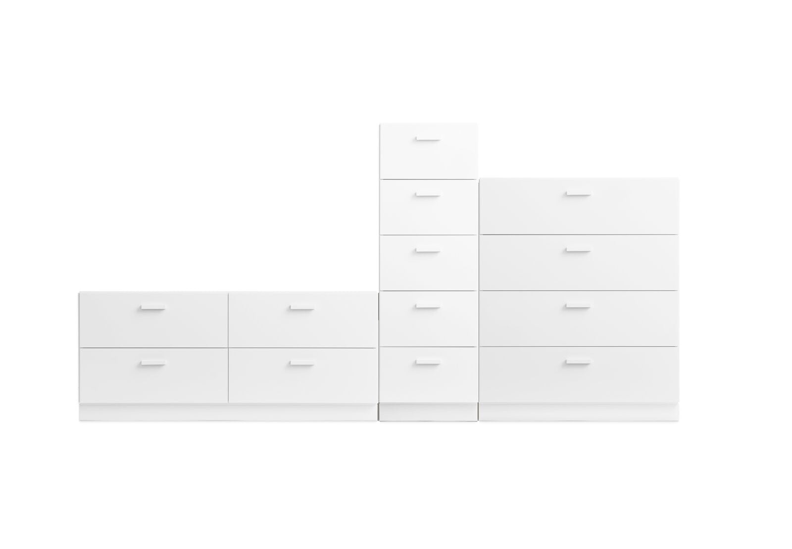 A dynamic combination from Relief. It consists of one tall, one low, and one wide chest of drawers from Relief. The three drawers are connected into one unit.