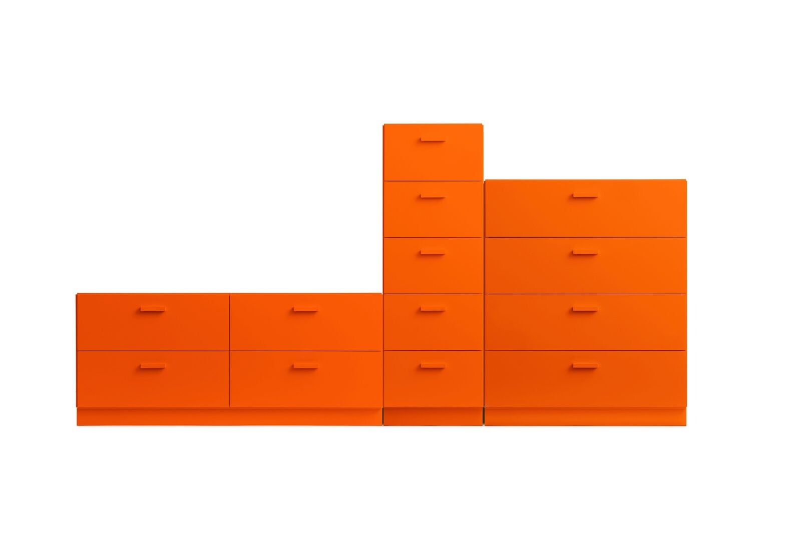 A dynamic combination from Relief. It consists of one tall, one low, and one wide chest of drawers from Relief. The three drawers are connected into one unit.