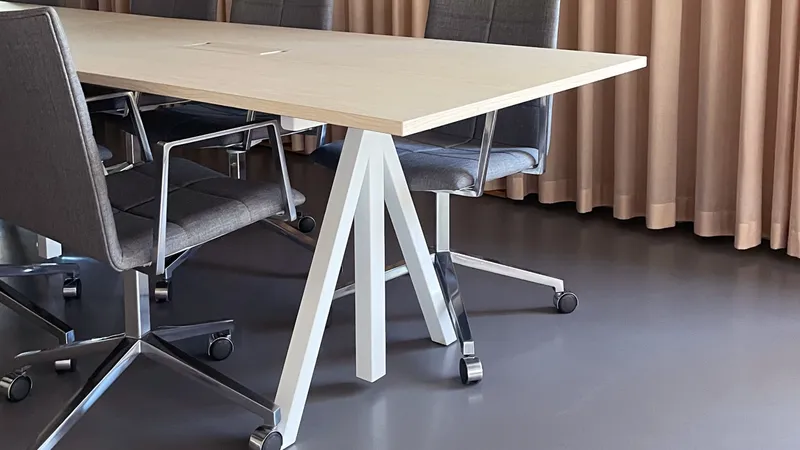 The unique design of the work desks' table frame